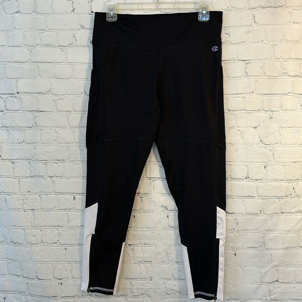 Champion athletic wear with zippers at bottom and pockets